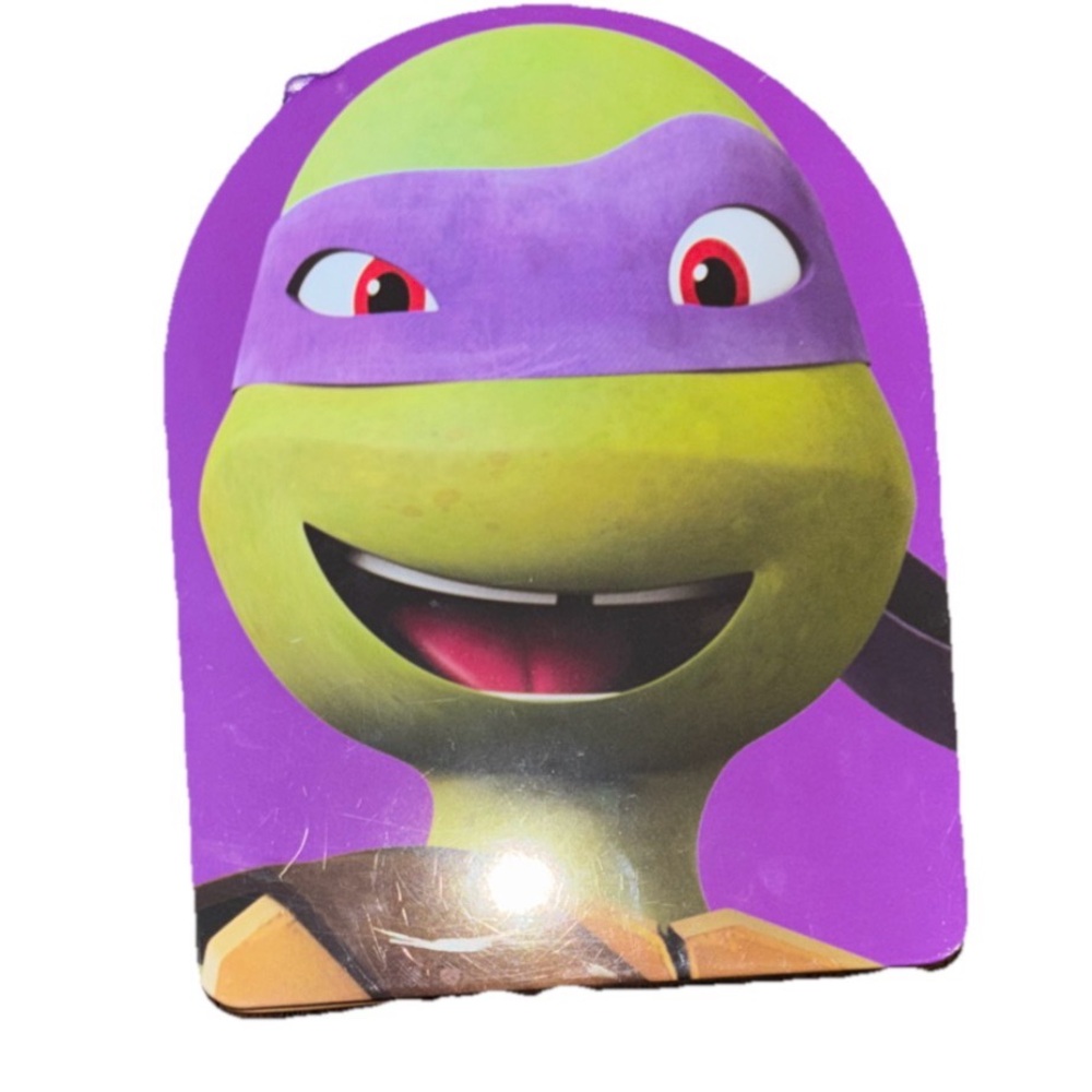 Donatello tin lunch box from the 2012 Teenage Mutant Ninja Turtles series.